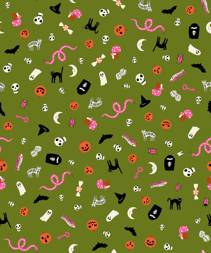 Whimsical Halloween icons on sprout green cotton quilting fabric from Boo Valley by Ruby Star Society's Alexia Abegg, featuring skulls, ghosts, jack-o'-lanterns, black cats, bats, pink snakes.