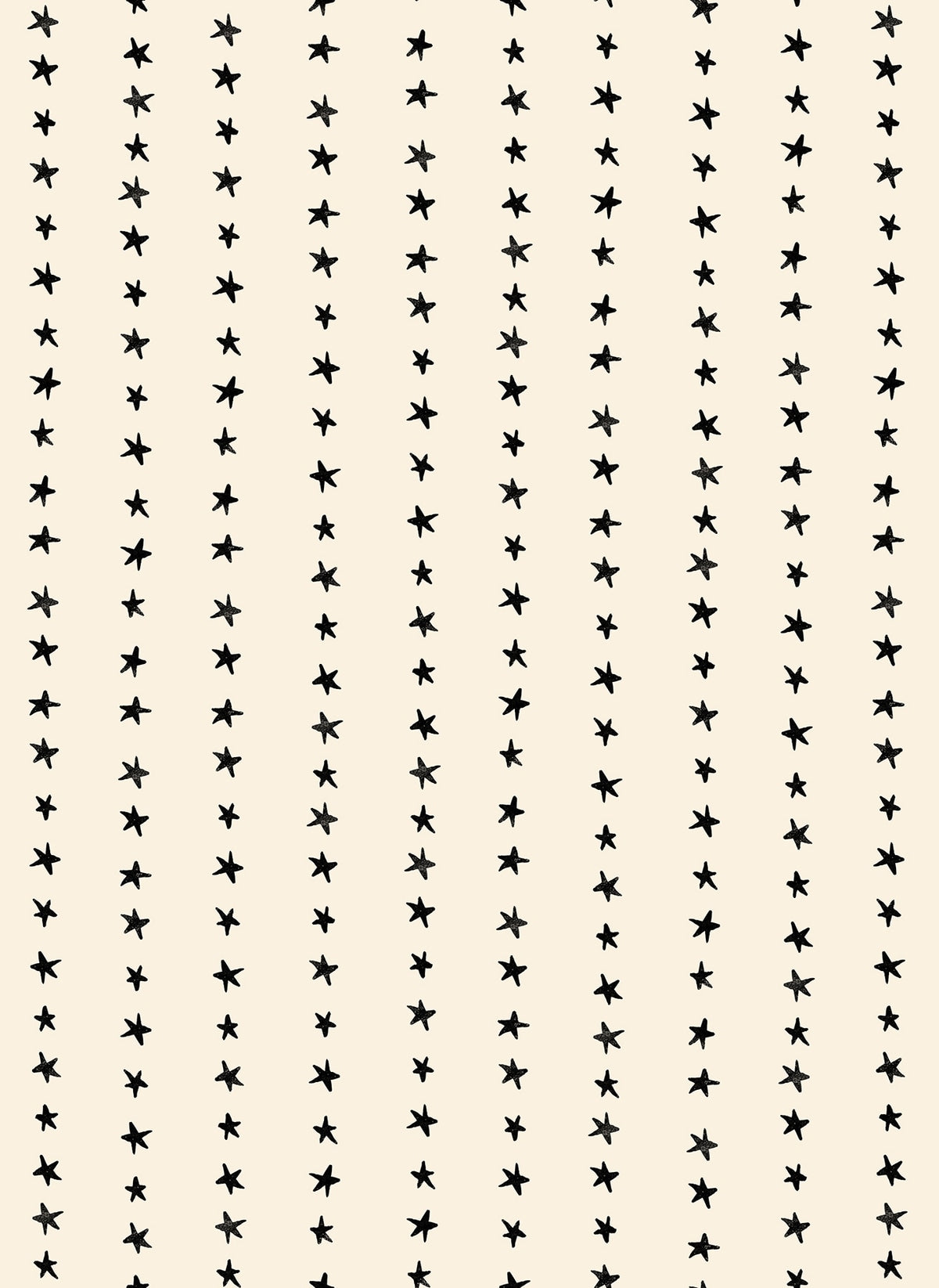 Moda's small hand-drawn black stars on natural Daisy Days by Ruby Star Society's Alexia Abegg cotton quilting fabric.