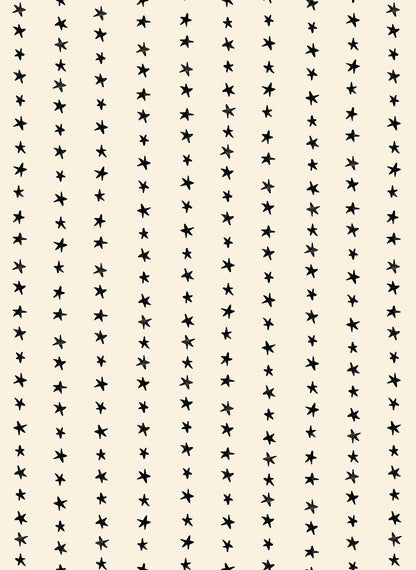 Moda's small hand-drawn black stars on natural Daisy Days by Ruby Star Society's Alexia Abegg cotton quilting fabric.