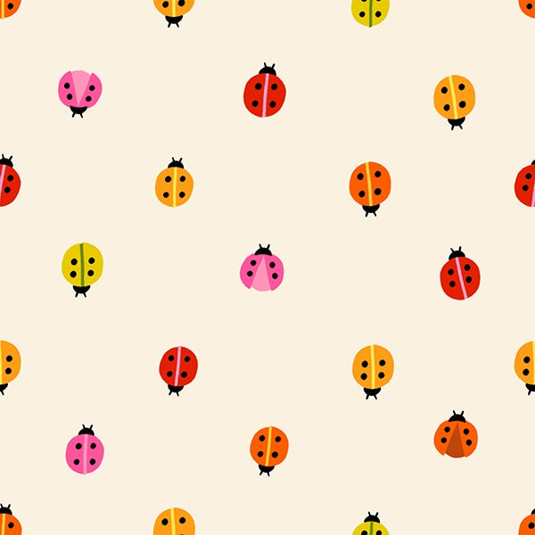 Colorful nursery ladybugs in red, orange, pink, and yellow on natural cotton quilting fabric. Daisy Days by Ruby Star Society's Alexia Abegg.
