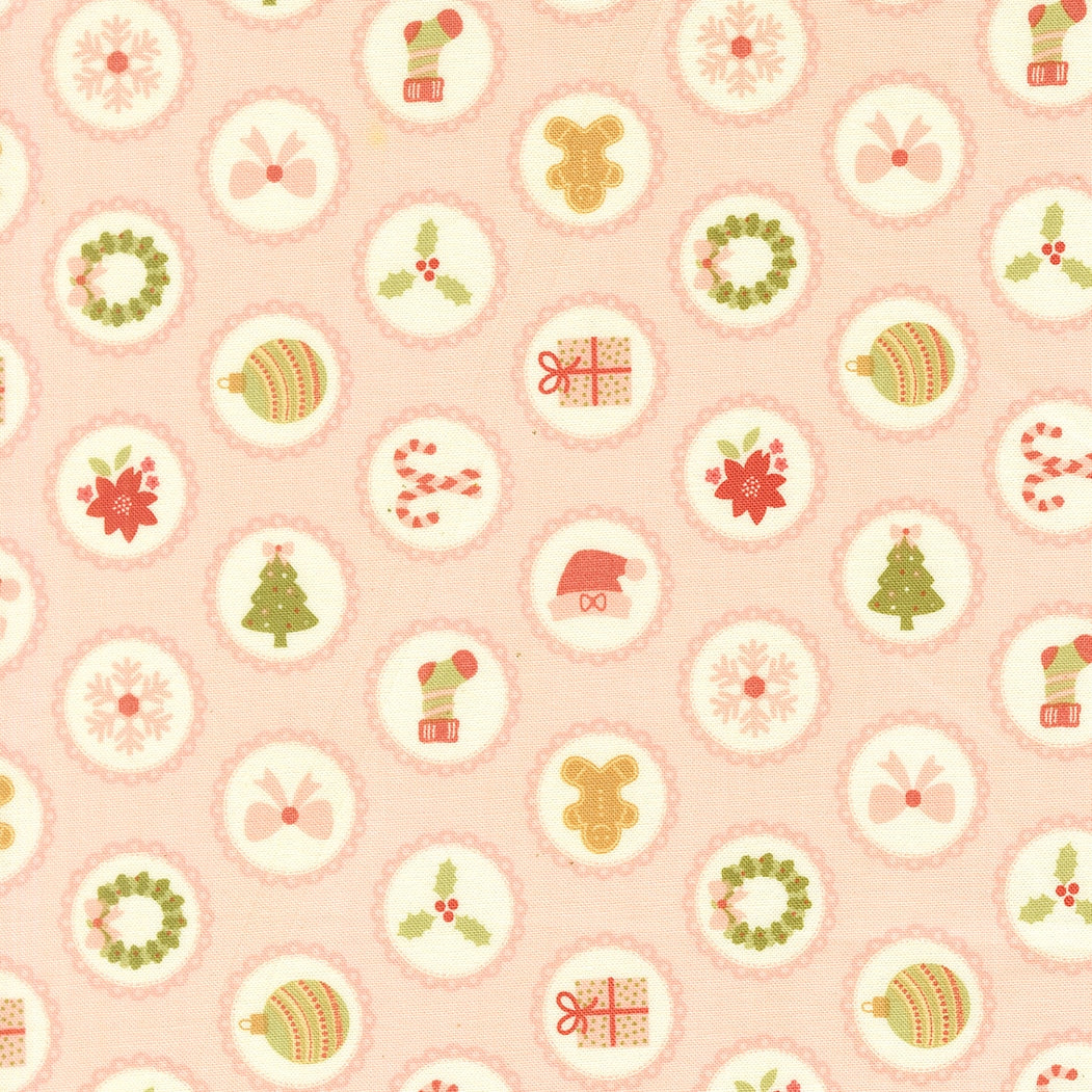 Christmas motifs on blush pink December Darling by My Sew Quilty Life cotton quilting fabric. Features snowflakes, gingerbread men, and Santa hats.
