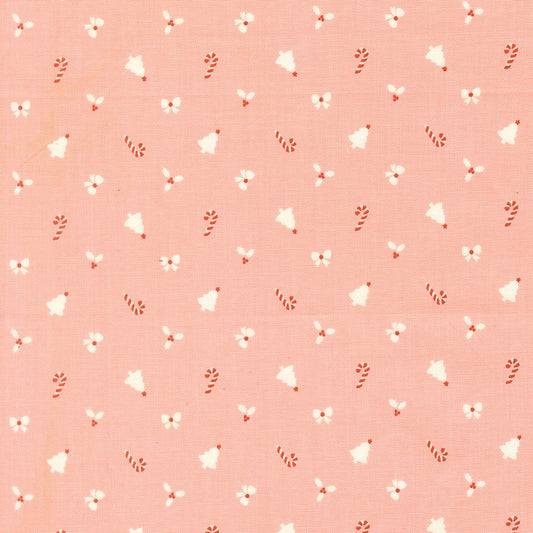 Christmas novelties on cotton candy pink December Darling by My Sew Quilty Life cotton quilting fabric, bells, candy canes, bows, holly sprigs.