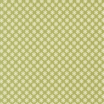 December Darling Christmas snowflakes on sage green cotton quilting fabric by My Sew Quilty Life. Features small, stylized ivory snowflakes in a geometric pattern.