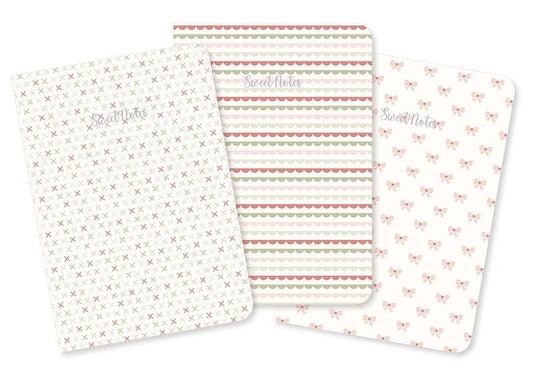 Moda's low volume cross stitches on cream quilting fabric from December Darling by Briggs, Heather, featuring muted rose, sage green, and light taupe crosses.