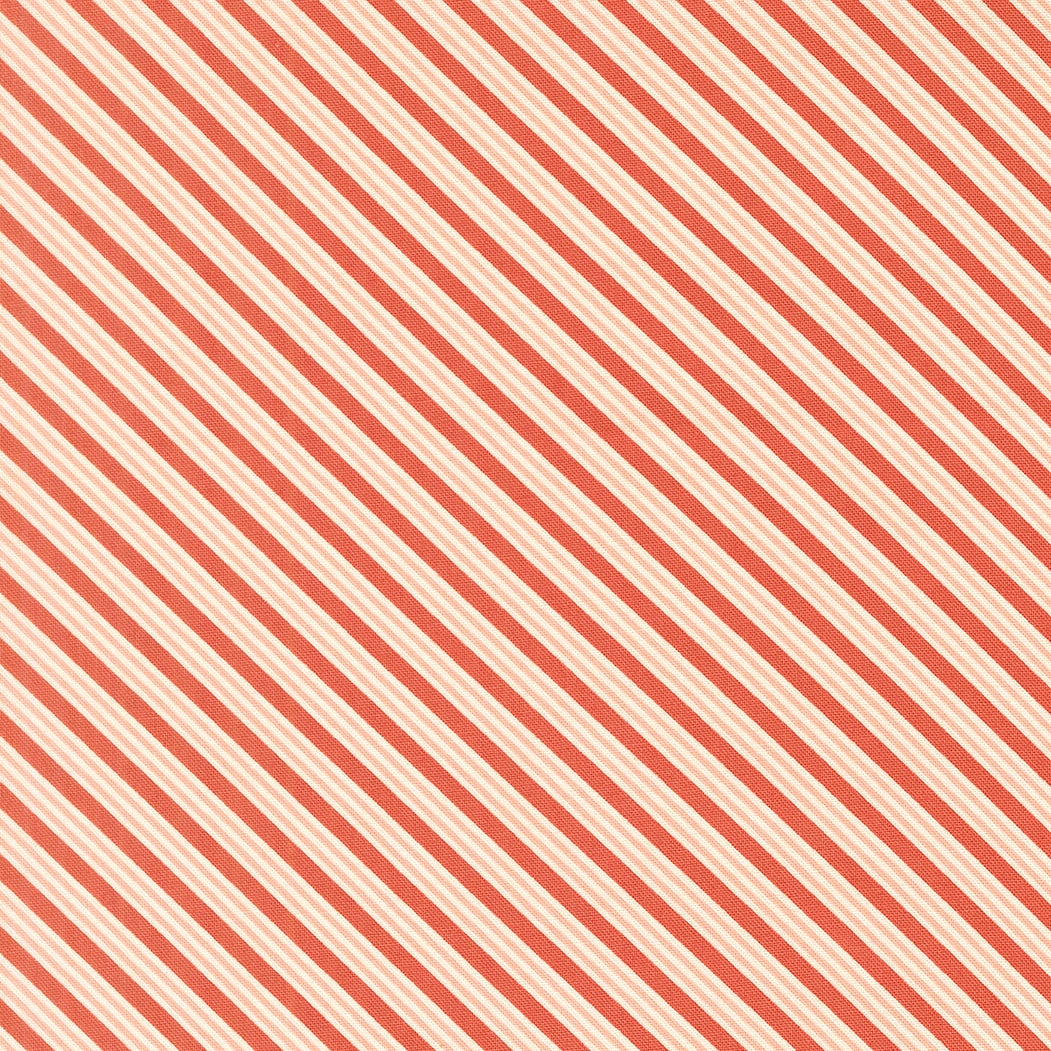 Moda's rose and pale peach diagonal stripes cotton quilting fabric from December Darling by My Sew Quilty Life.