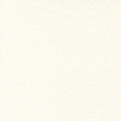 Moda's light cream cotton quilting fabric with tiny white scattered stars. December Darling by My Sew Quilty Life.