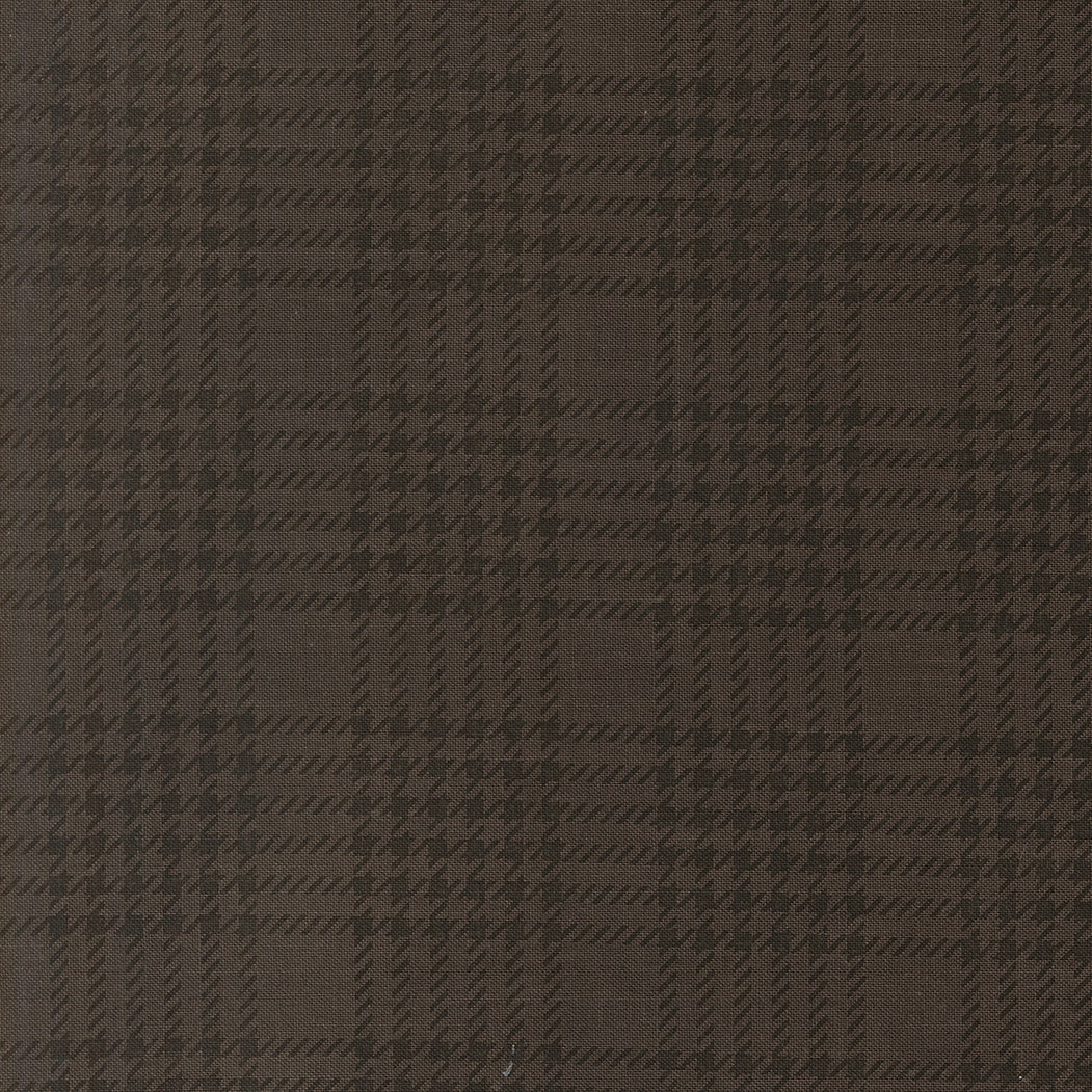 Moda's charcoal plaid cotton quilting fabric from Gothic Haunt by Stacy Iest Hsu, with black houndstooth texture.