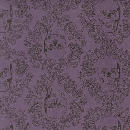Moda's purple skull damask Gothic Haunt by Stacy Iest Hsu cotton quilting fabric for Halloween. Features flowers, leaves, and skulls in plum on purple haze.
