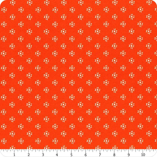 Cotton quilting fabric pattern called 'Starshine in Warm Red'. Part of the 'Heirloom' fabric collection. Designed by Ruby Star Society for fabric company Moda Fabrics. SKU: RS4025 14. 44-45 inch width.