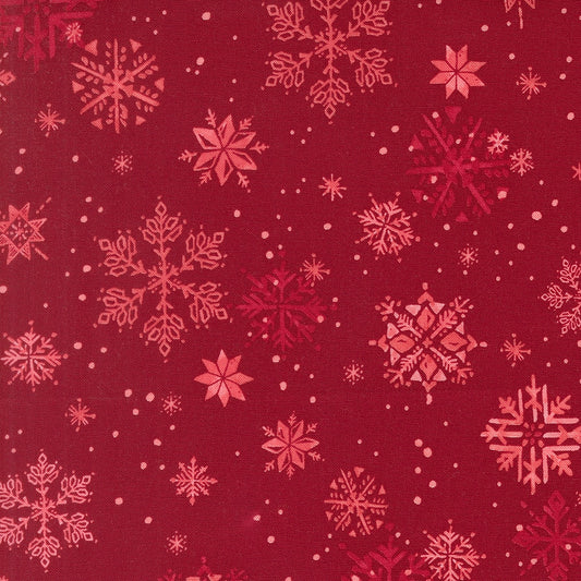 Moda's Christmas snowflakes on crimson cotton quilting fabric from Mums Christmas by Robin Pickens, with red and pale pink dots.