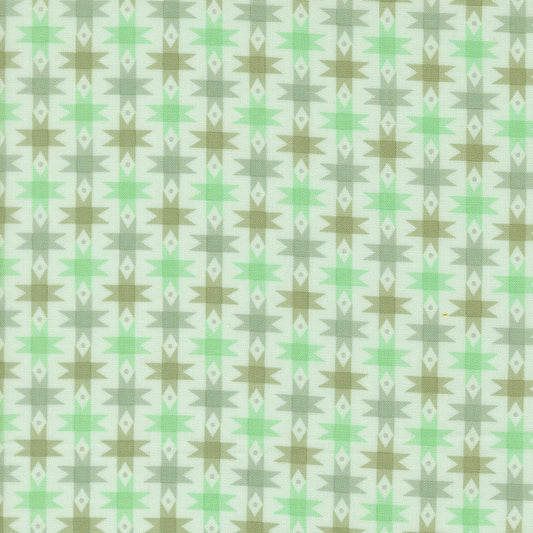 Moda's muted green and brown geometric stars Popcorn by Elizabeth Hartman cotton quilting fabric. Features jagged star shapes, diamonds, and zigzags on light aqua.