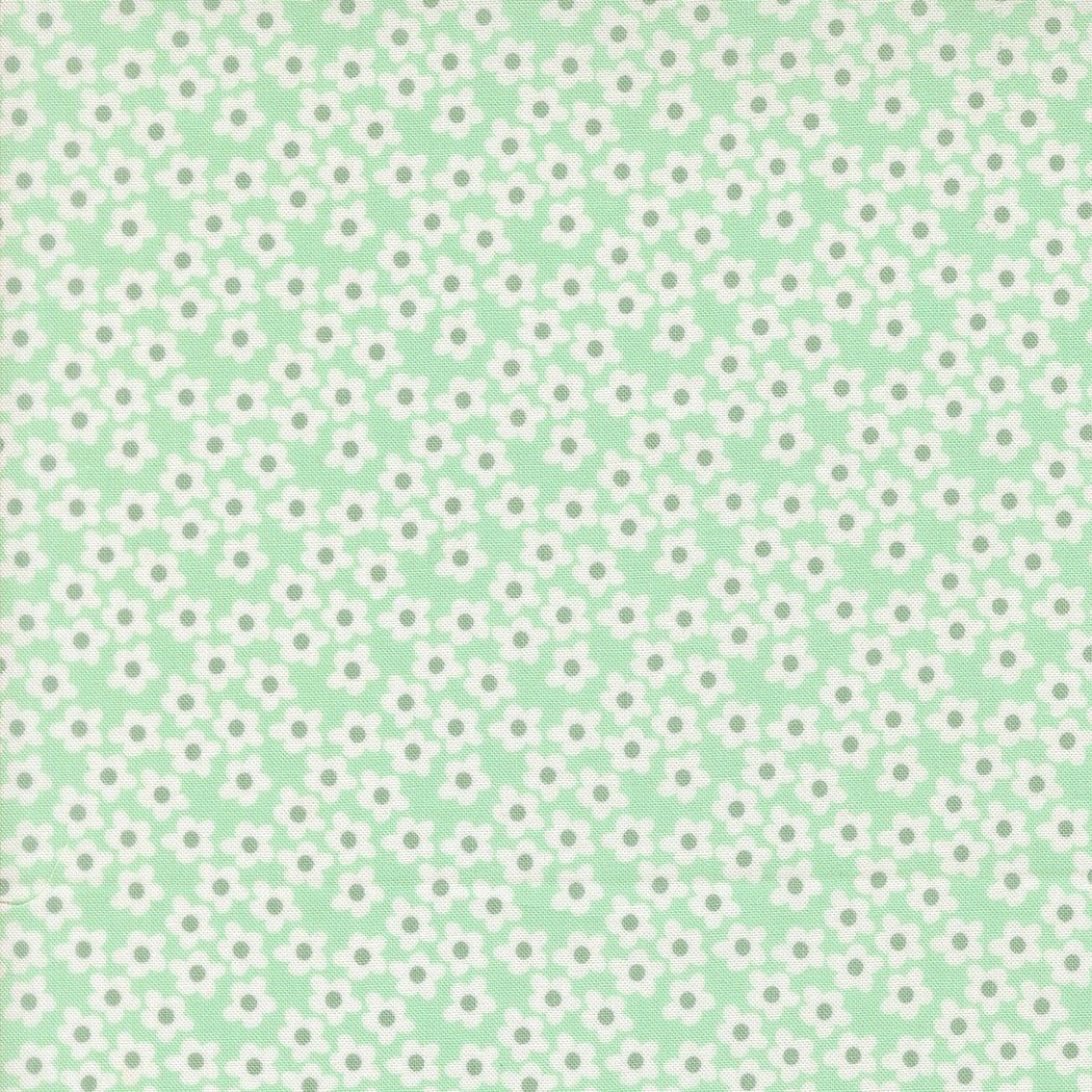 Moda's aqua small flowers blender Popcorn by Elizabeth Hartman cotton quilting fabric. Small white stylized flowers with gray centers.