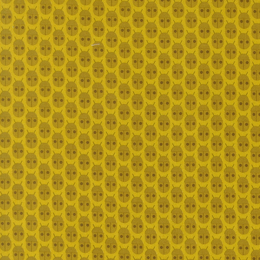 Moda's citrine bug print cotton quilting fabric from Popcorn by Elizabeth Hartman, featuring small olive brown ladybugs on bright citrine yellow.