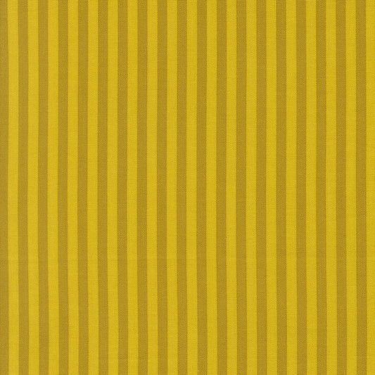 Moda's alternating citrine and olive green vertical stripes Popcorn by Elizabeth Hartman cotton quilting fabric.