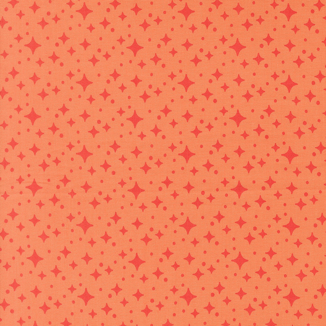 Moda's celestial coral stars and dots on light coral ground. Popcorn by Elizabeth Hartman cotton quilting fabric.