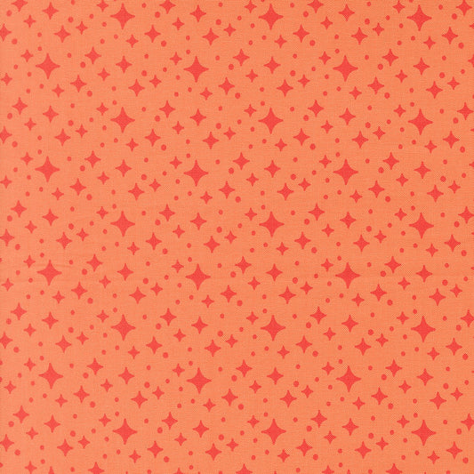 Moda's celestial coral stars and dots on light coral ground. Popcorn by Elizabeth Hartman cotton quilting fabric.
