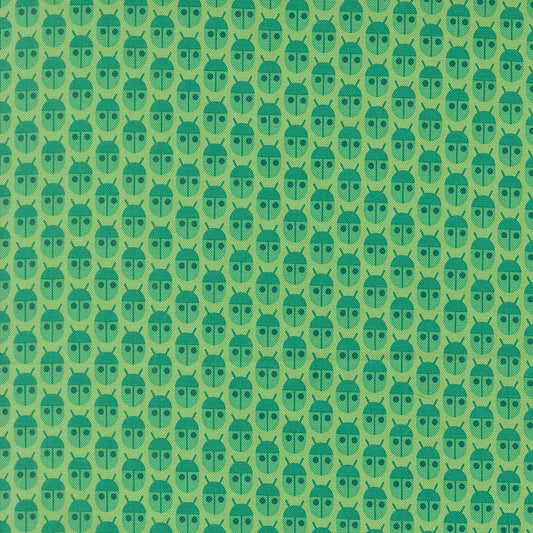 Moda's Popcorn by Elizabeth Hartman cotton quilting fabric with small, stylized jade green beetles and charcoal eyes on a light mint background.