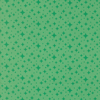 Moda's jade green stars blender Popcorn by Elizabeth Hartman cotton quilting fabric with celestial themed small stars and dots in emerald green.