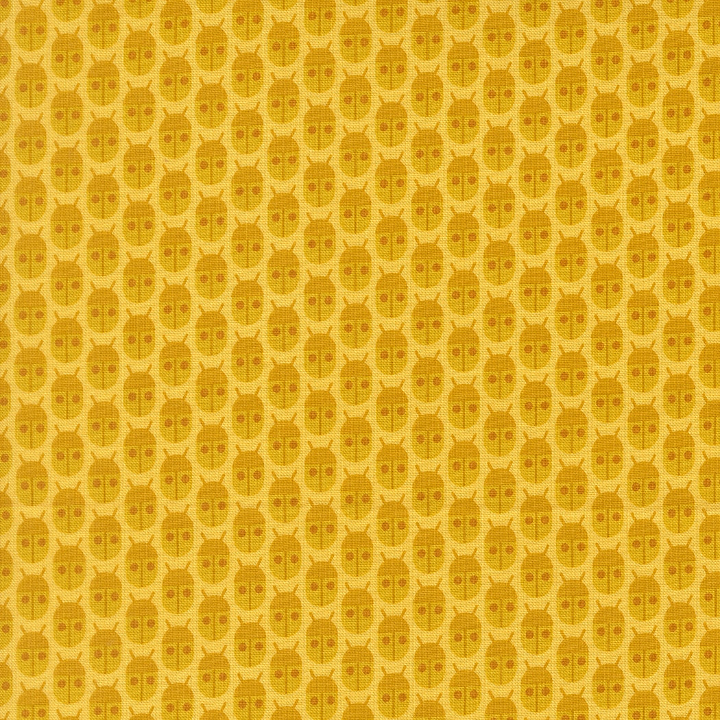 Lemon beetles on Popcorn by Elizabeth Hartman cotton quilting fabric. Whimsical nursery design with mustard yellow and chocolate brown insects on light yellow.