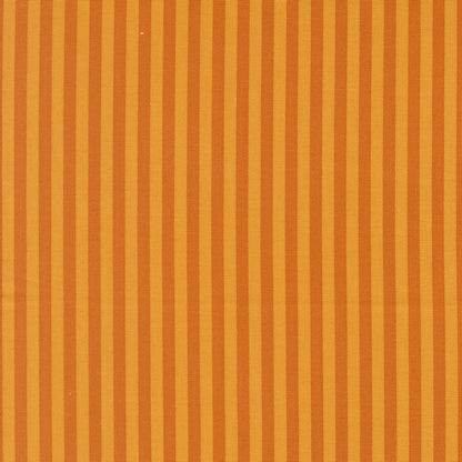 Moda's evenly spaced vertical stripes alternating between warm longhorn orange and darker burnt orange Popcorn by Elizabeth Hartman cotton quilting fabric.