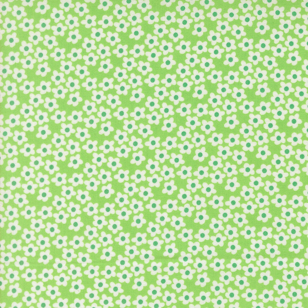 Small white flowers on mint green cotton quilting fabric, Moda's Popcorn by Elizabeth Hartman. spring garden floral blender with emerald green accents.
