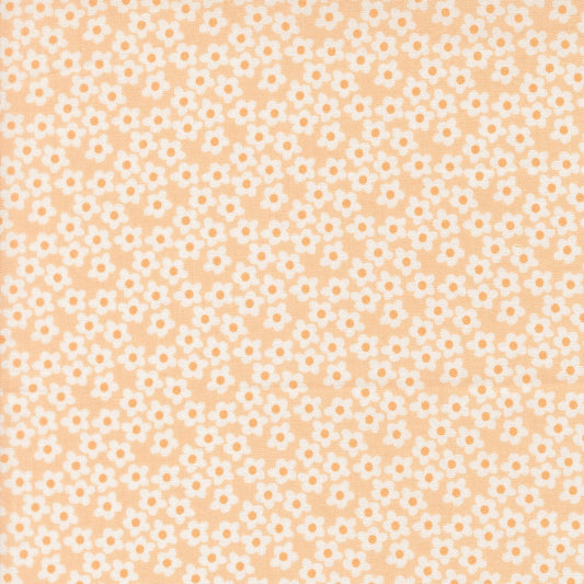 Moda's Popcorn by Elizabeth Hartman cotton quilting fabric features small white flowers with tiny light orange centers on a peach background.