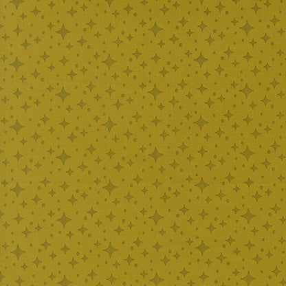 Moda's pesto green stars blender, Popcorn by Elizabeth Hartman cotton quilting fabric, featuring small dark olive green stars and dots.