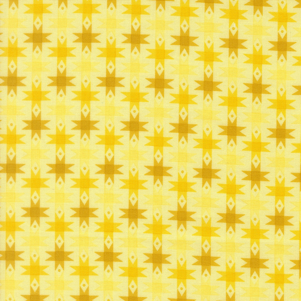 Moda's Popcorn by Elizabeth Hartman cotton quilting fabric with sunshine yellow and mustard gold geometric stars on pale yellow.