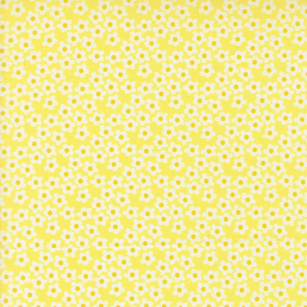 Moda's Popcorn by Elizabeth Hartman cotton quilting fabric: small white flowers on sunshine yellow. Ideal for spring and summer.