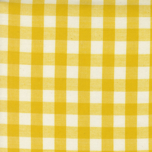 Lemon yellow gingham check cotton quilting fabric from Moda's Popcorn Wovens by Elizabeth Hartman, featuring ivory squares.