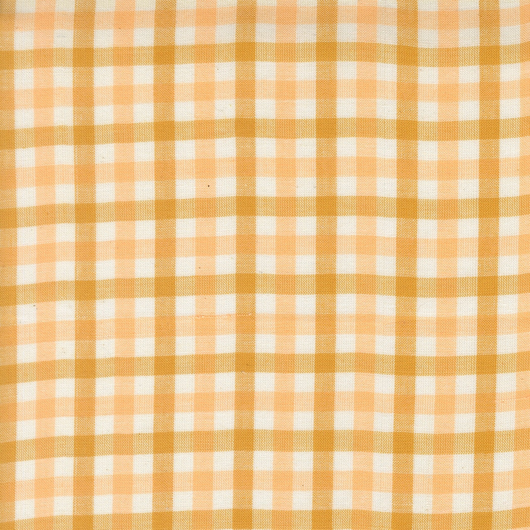 Moda's peach gingham checks cotton quilting fabric from Popcorn Wovens by Elizabeth Hartman. Classic pattern in white, light peach, and golden peach.