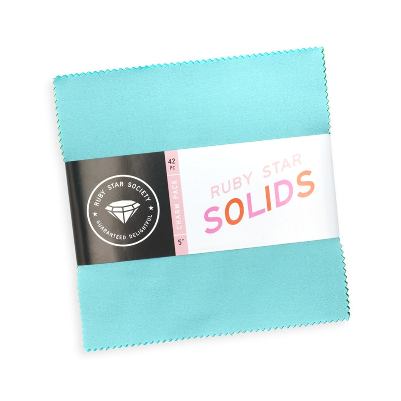 Moda's Ruby Star Solids Charm Pack by Ruby Star Society's Ruby Star Society. 42 squares of cotton quilting fabric, 5 in x 5 in, SKU RS5500PP.