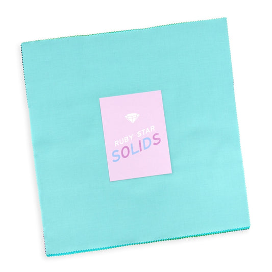 Ruby Star Solids Layer Cake by Ruby Star Society's Ruby Star Society. 42 squares of cotton quilting fabric. SKU RS5500LC