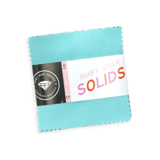 Moda's Ruby Star Solids Mini Charm Pack by Ruby Star Society's Ruby Star Society. 42 squares of cotton quilting fabric, 2.5 in x 2.5 in, SKU RS5500MC