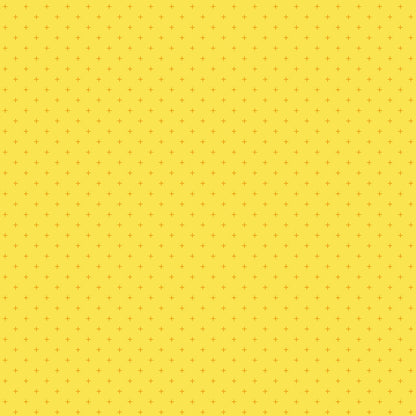Chrome yellow cotton quilting fabric with small amber orange geometric plus signs from Moda's Sidekicks by Ruby Star Society's Ruby Star Society.