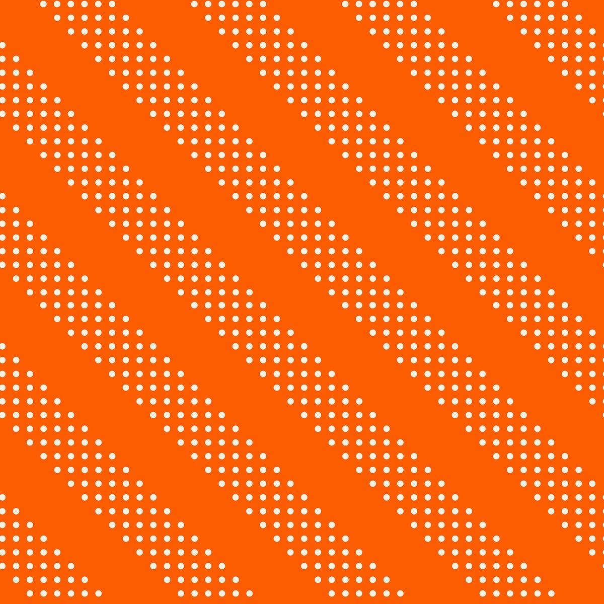 Small white diagonal polka dots create a striped effect on goldfish orange cotton quilting fabric. Sidekicks by Ruby Star Society's Ruby Star Society.