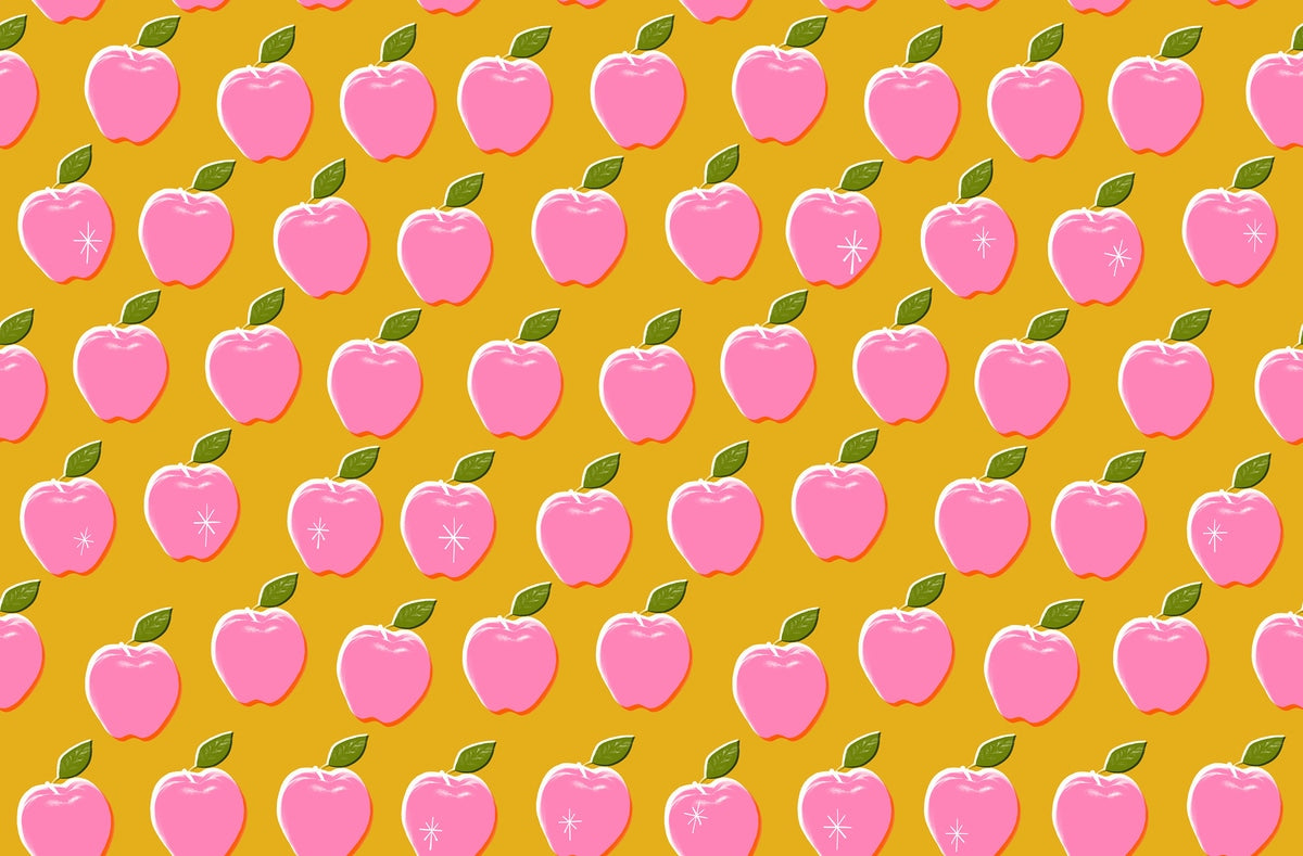 Moda's pink apples on goldenrod Sparkle Shopper by Ruby Star Society's Melody Miller cotton quilting fabric, with green leaves and white starburst accents.