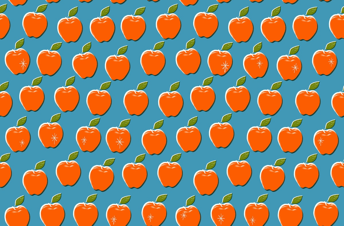 Stylized orange apples and green leaves on vintage blue cotton quilting fabric. Moda's Sparkle Shopper by Ruby Star Society's Melody Miller.