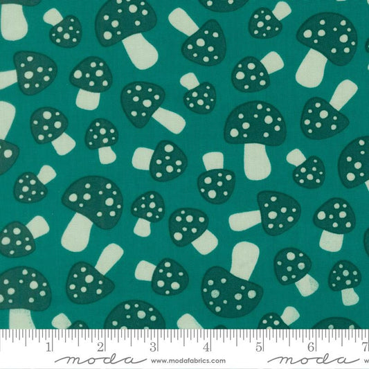 Moda's Toast and Jam by Elizabeth Hartman cotton quilting fabric, featuring dark teal mushrooms with scattered spots on a deep teal background.