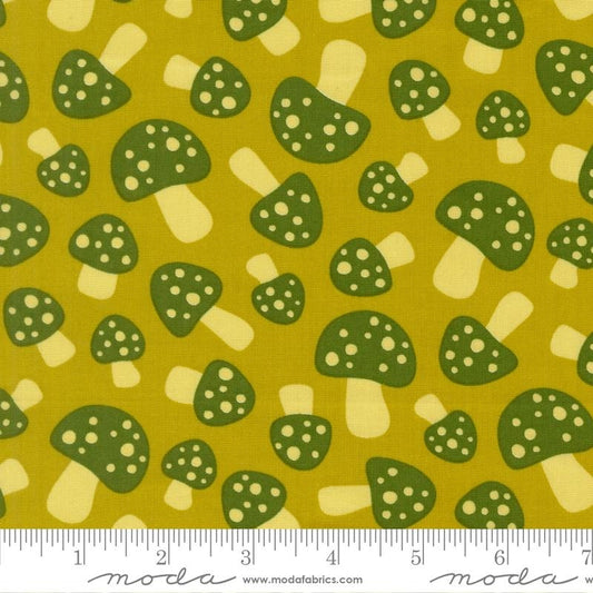 Woodland mushrooms, dark green caps with cream polka dots, cream stems, on split pea green Toast and Jam by Elizabeth Hartman cotton quilting fabric.