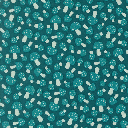 Moda's woodland dark teal polka dot mushrooms cotton quilting fabric from Toast and Jam by Elizabeth Hartman, with lighter teal caps and cream white stems.