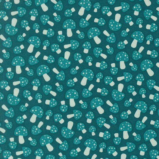 Moda's woodland dark teal polka dot mushrooms cotton quilting fabric from Toast and Jam by Elizabeth Hartman, with lighter teal caps and cream white stems.