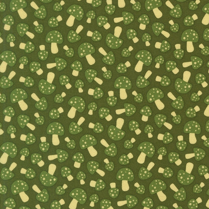 Green spotted mushrooms scattered across dark green cotton quilting fabric. Toast and Jam by Elizabeth Hartman. Woodland theme.