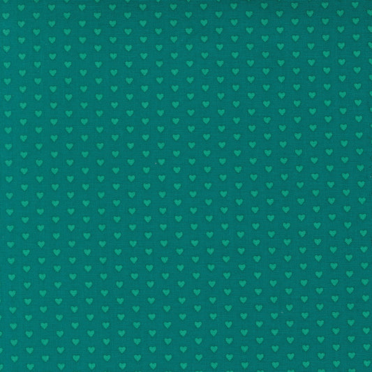 Moda's lagoon small hearts Toast and Jam by Elizabeth Hartman cotton quilting fabric, with small aqua hearts patterned on a deep lagoon background.