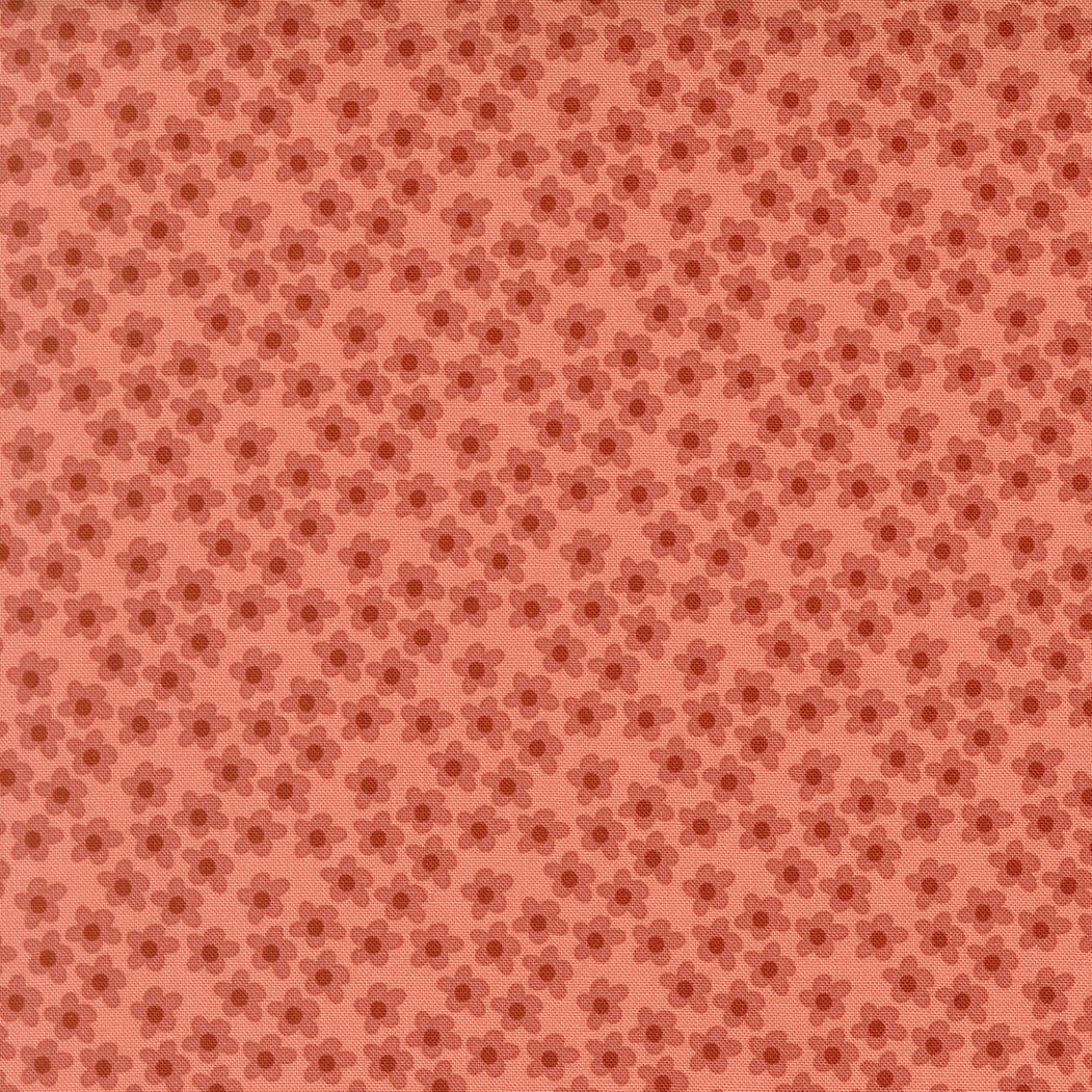 Moda's small muted rose flowers with reddish brown centers on rose amber Toast and Jam by Elizabeth Hartman cotton quilting fabric.