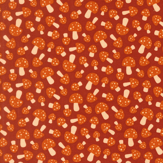Rust mushrooms cotton quilting fabric, Toast and Jam by Elizabeth Hartman. Small orange spotted mushrooms on deep rust.