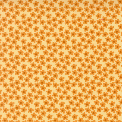 Small orange flowers on soft yellow Moda's Toast and Jam by Elizabeth Hartman cotton quilting fabric, featuring apricot orange and caramel brown.