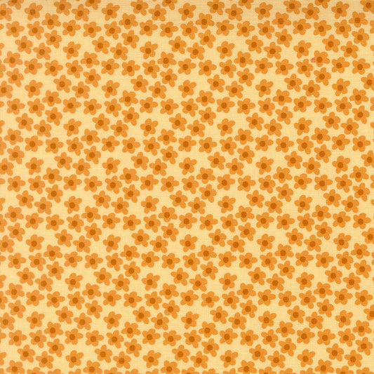 Small orange flowers on soft yellow Moda's Toast and Jam by Elizabeth Hartman cotton quilting fabric, featuring apricot orange and caramel brown.