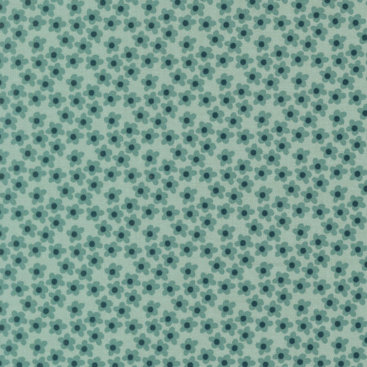 Moda's small stylized five-petal storm blue flowers on mint green cotton quilting fabric from Toast and Jam by Elizabeth Hartman