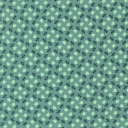 Moda's teal ditsy floral print with small stylized tulips and bows in diagonal rows. Toast and Jam by Elizabeth Hartman cotton quilting fabric.